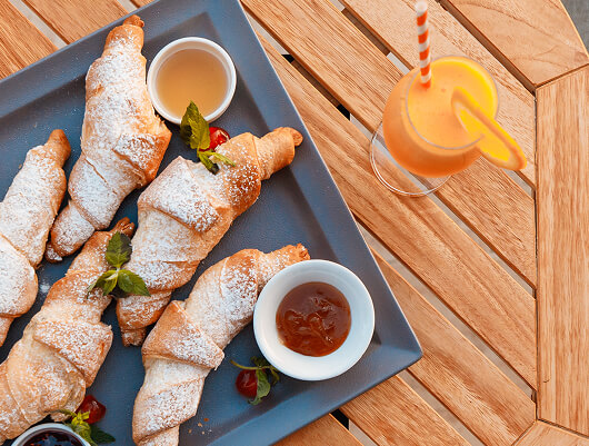 croissants-on-plate-with-juice